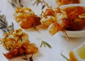 Monkfish with bacon on a rosemary stem