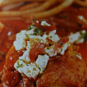 Chicken in tomato sauce with bucatini pasta