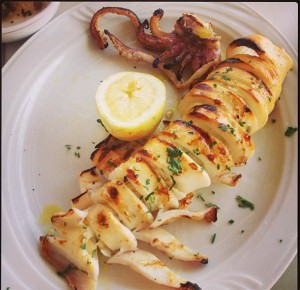 Garlicky grilled squid stuffed with feta cheese