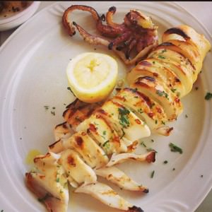 Garlicky grilled squid stuffed with feta cheese