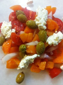 Savory apricot salad with tomatoes, olives and feta cheese